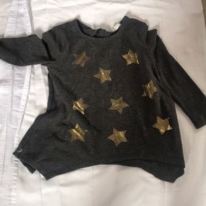 Between size 8 shirt